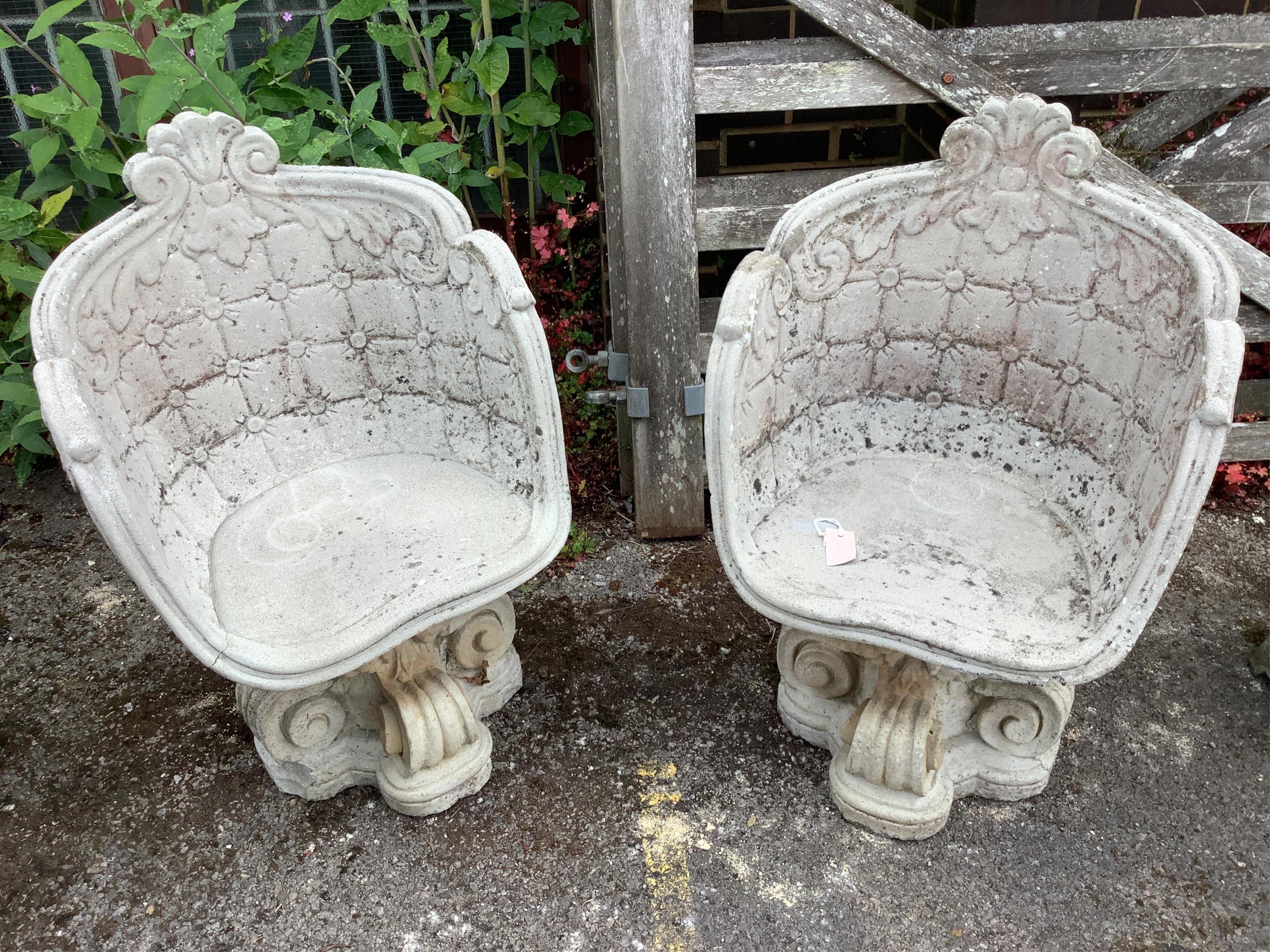A pair of reconstituted stone garden seats, width 55cm, depth 44cm, height 84cm. Condition - good